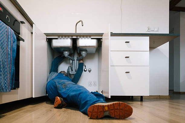 Professional Drain Cleaning technician working in Gilford, NH